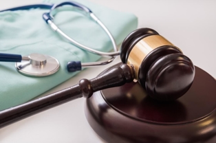 Gavel next to a stethoscope 